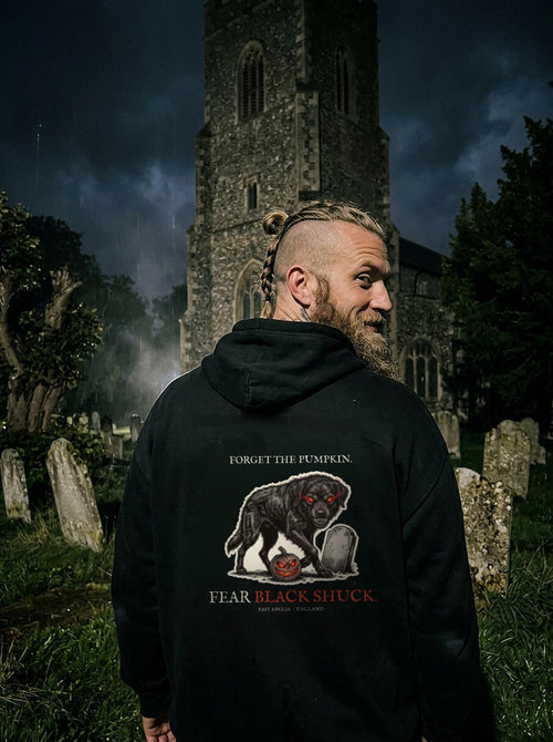 Black Shuck hoodie worn in scene, back print