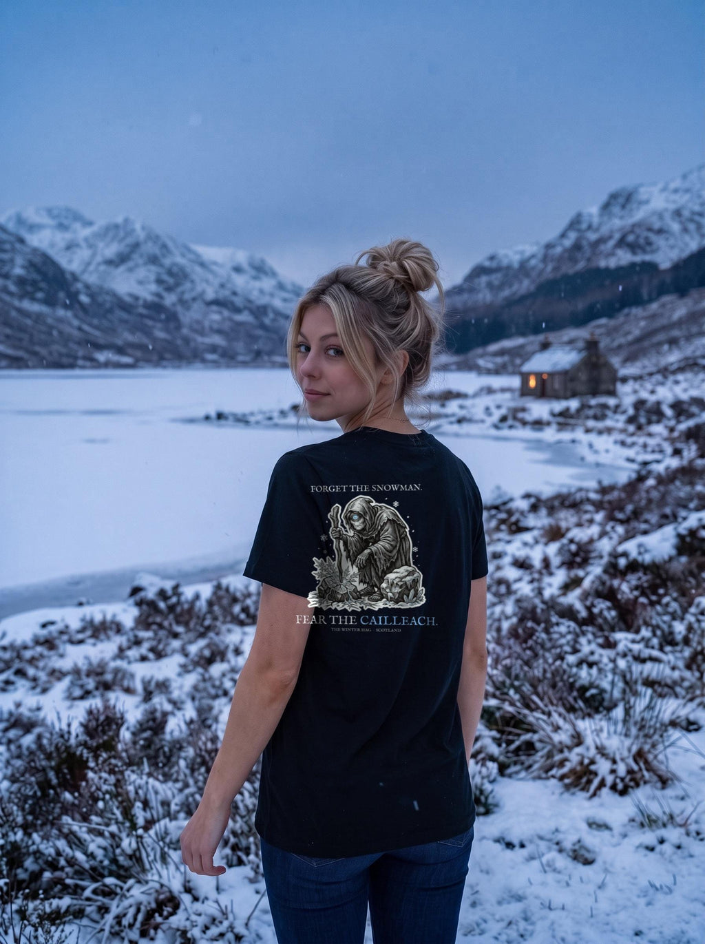 Cailleach t-shirt worn in a winter scene, showing the big back print